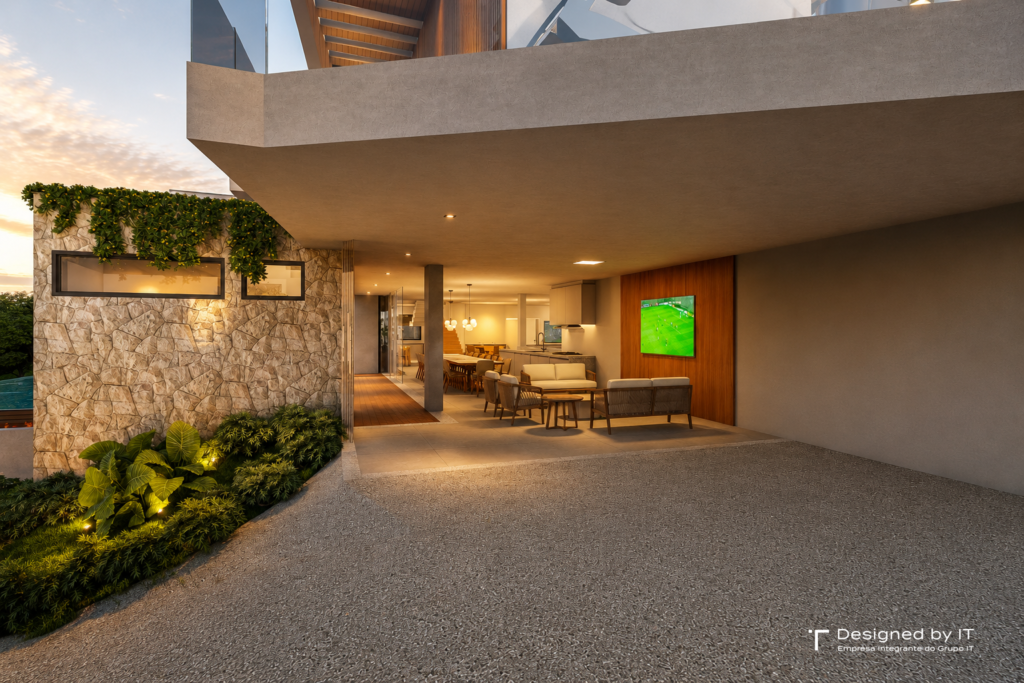 Parede de pedra natural com paisagismo em casa contemporânea